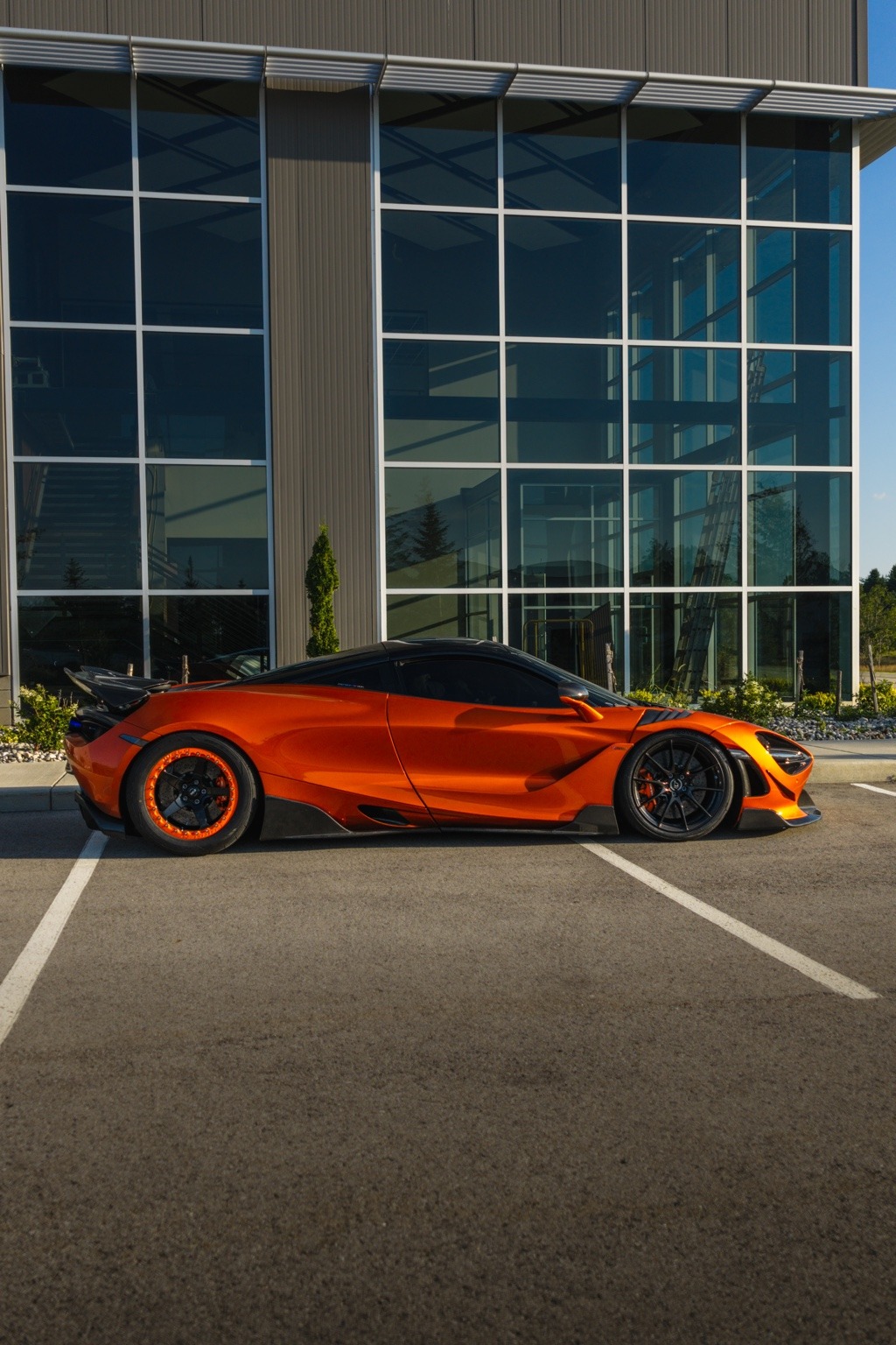 Orange McLaren with carbon fiber aerodynamic components